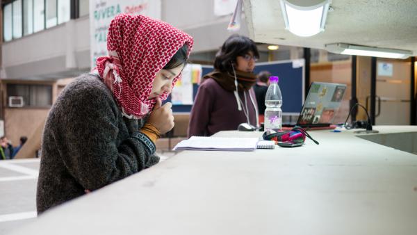 International Students studying at a table