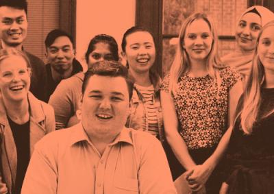 Group of smiling students - orange tinted square image