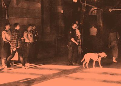 Police with sniffer dog at train starion