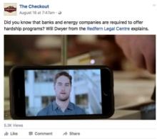 Facebook post of a photo of a man with brown hair displayed on a mobile phone.