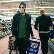 Man wearing COVID mask in a supermarket